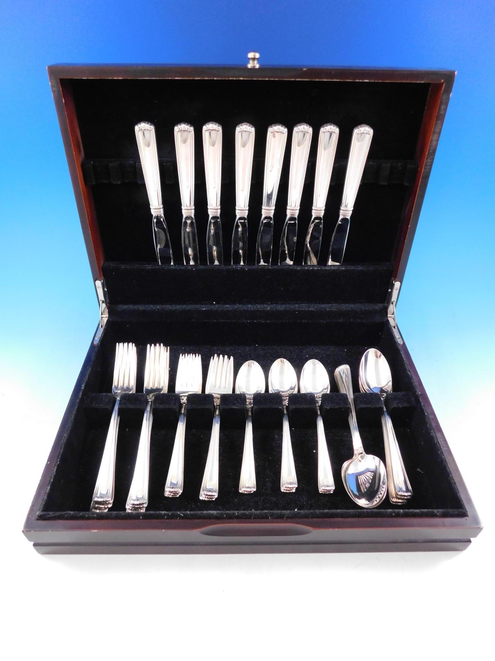 Embassy Scroll by Lunt sterling silver flatware set, 40 pieces. This set includes:

8 knives, 8 3/4