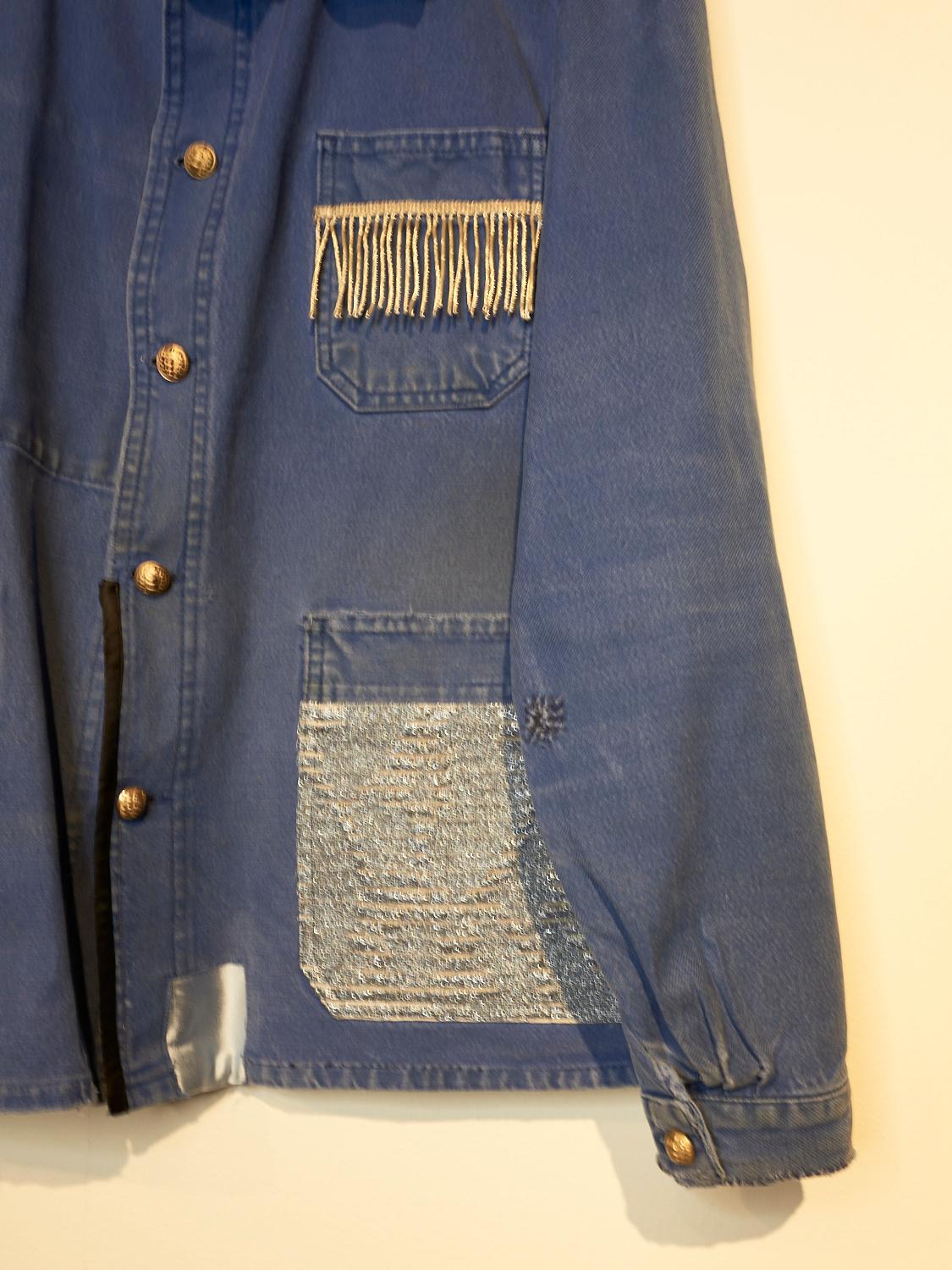 Embellished Repurposed Original Collectible French Blue Distressed Jacket from the 60's in its original color, French Designer Lightblue Lurex Fabric and Black Silk Details, Gold Vintage Military Buttons J Dauphin
One of a kind

Brand: J