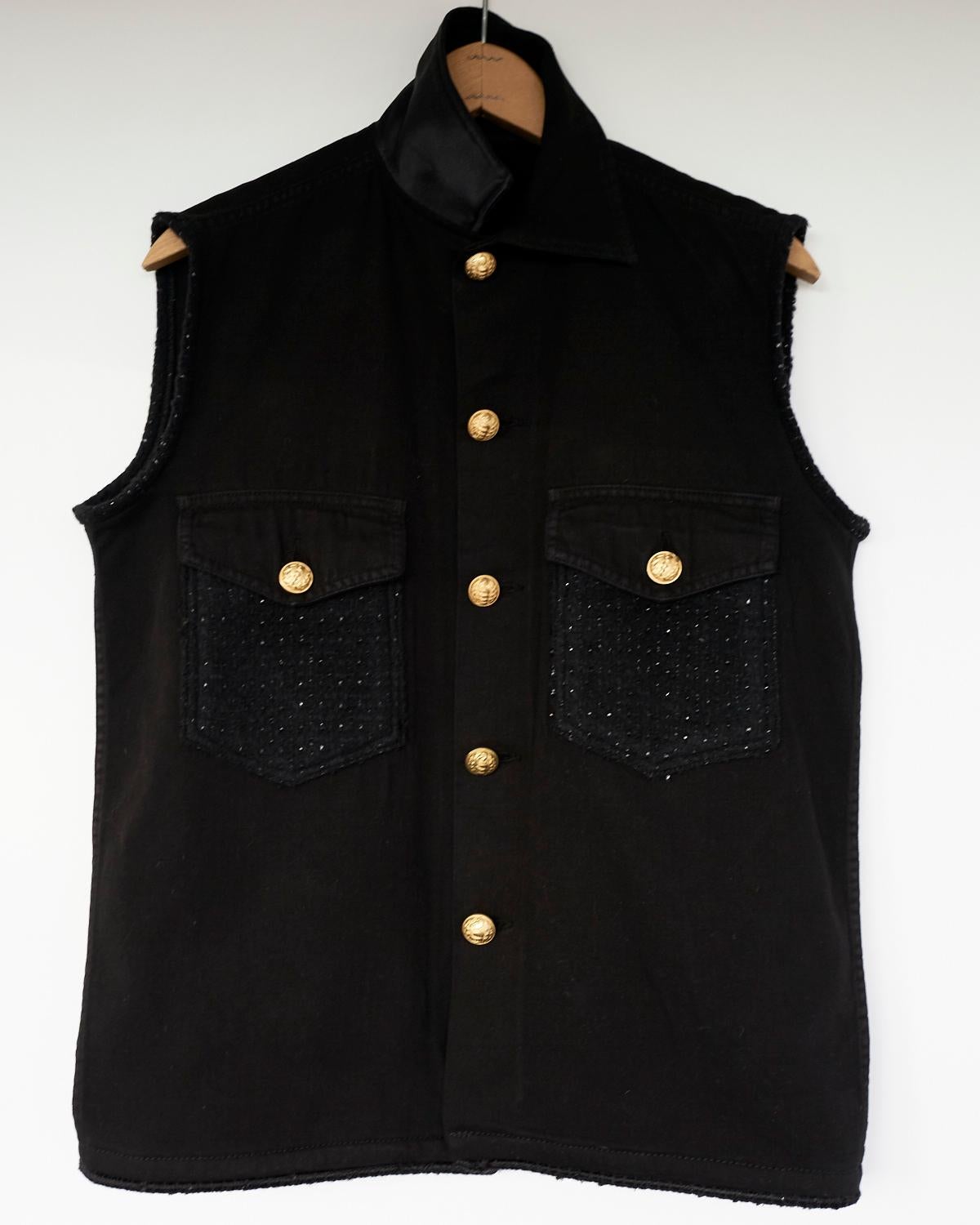 black and gold vest