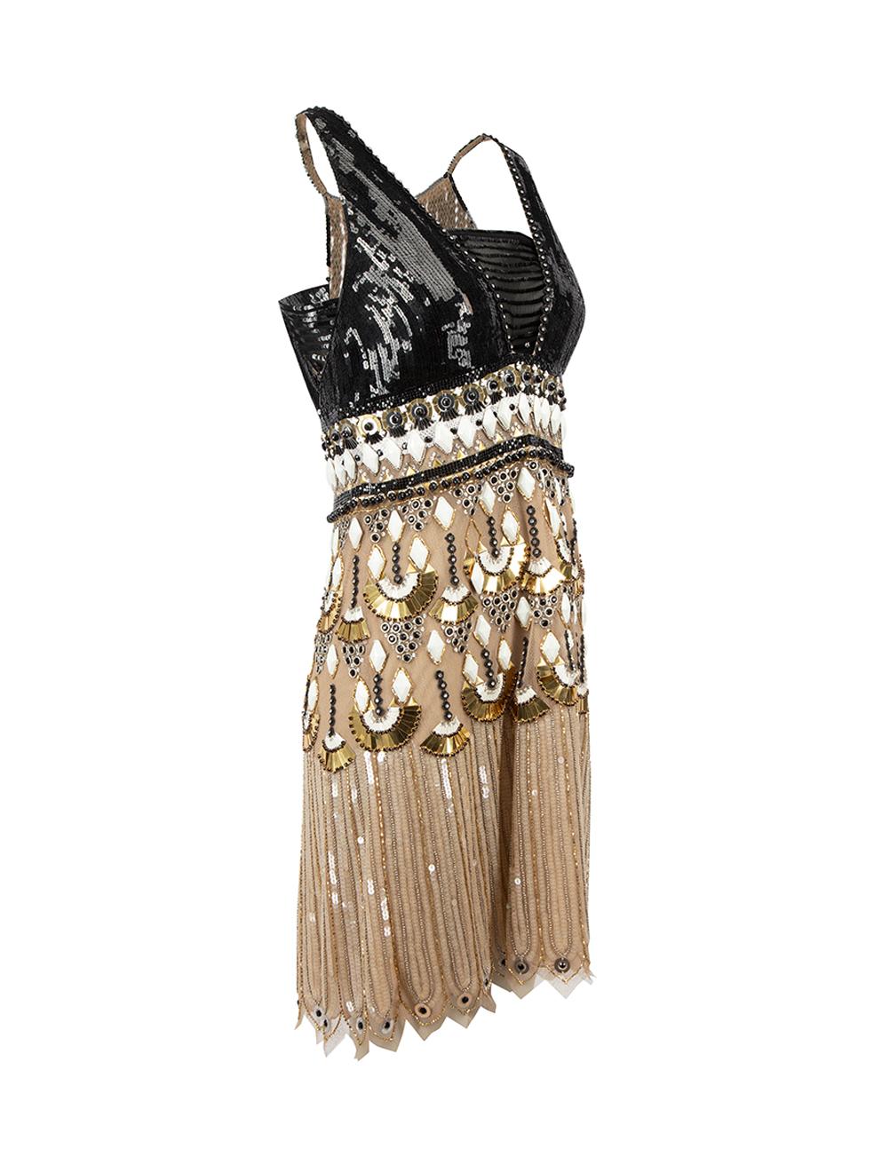 CONDITION is Good. General wear to dress is evident. Moderate signs of wear to embellishment with loose beads, embellishments, thread ends and sequins throughout on this used Jenny Packham designer resale item.



Details


Beige, black, white and