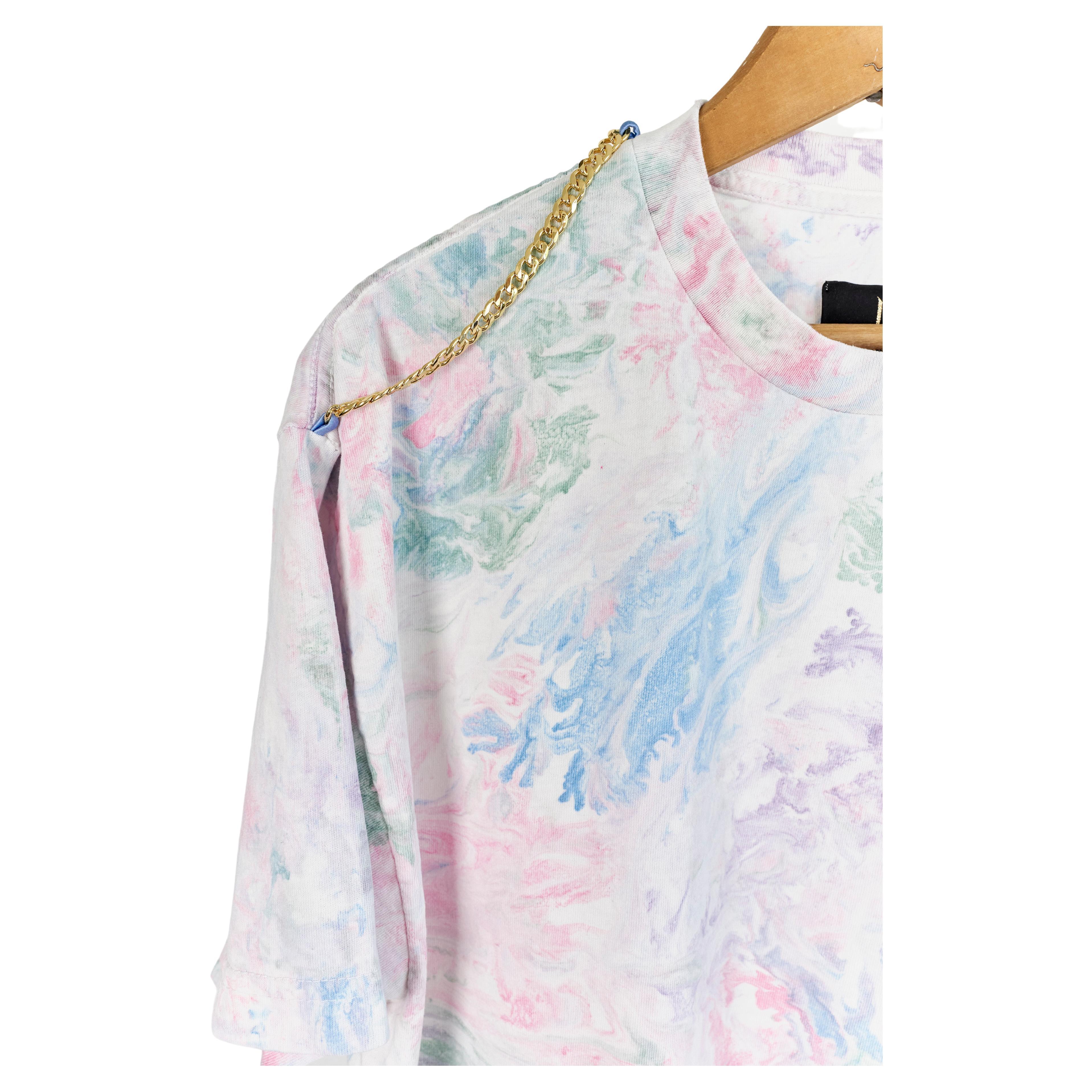 Embellished Marble Dye T-Shirt Pastel Colors with Gold Tone Chain 
100% Cotton
Brand: J Dauphin

J Dauphin was created 2006 by Swedish French Johanna Dauphin. She started her career working for LVMH owned Fend at the Italian head office in Rome. She