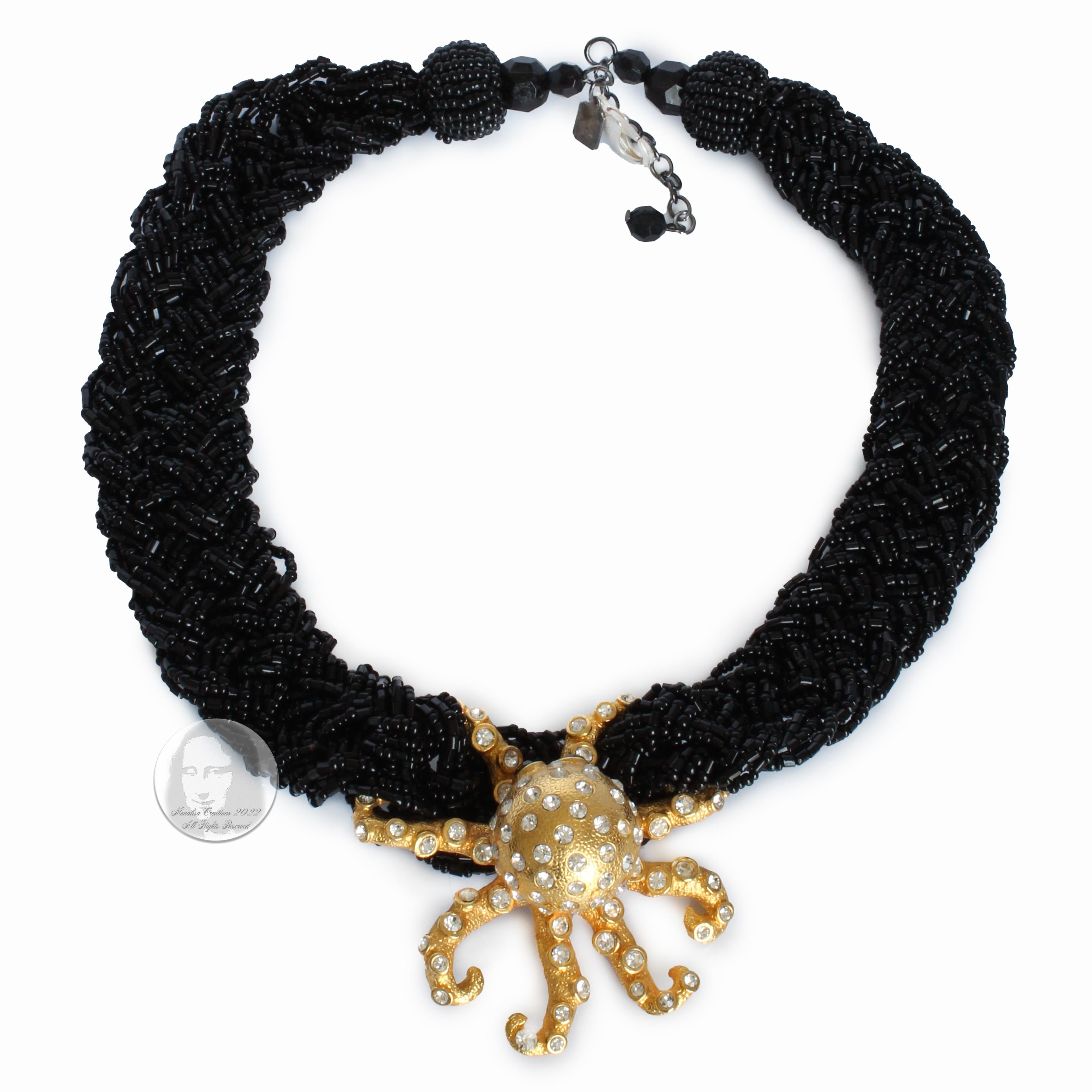 This one-of-a-kind piece was created by Stephanie Lake Design in 2013.  It features an antique, rhinestone-encrusted golden octopus set on a thick black jet bead braided chain.  

One of a kind, this is a spectacular piece, guaranteed to generate