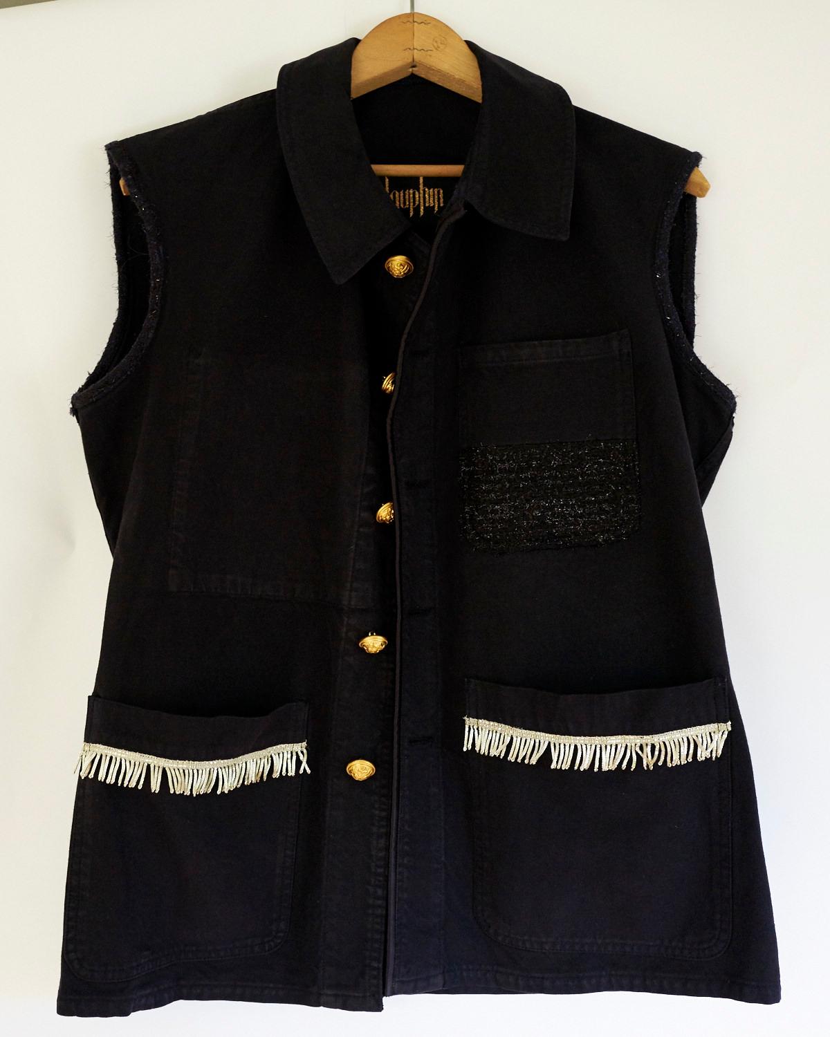 Embellished French Work Jacket Repurposed into Sleeveless Jacket Vest With Antique French Silver Bullion Fringe Silver Braid Black Silk Collar and Black Shiny Pocket, Gold Buttons, One of a kind
Brand: J Dauphin
Size: Small Medium
Sustainable