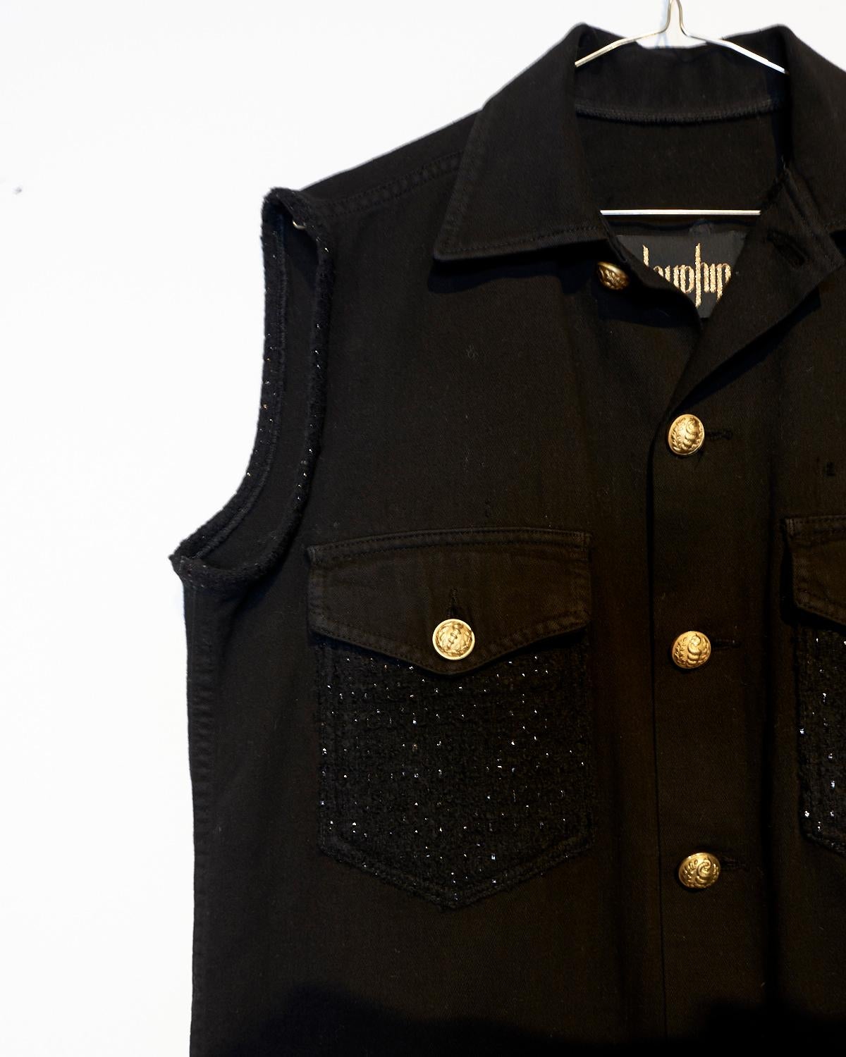 black vest with gold buttons