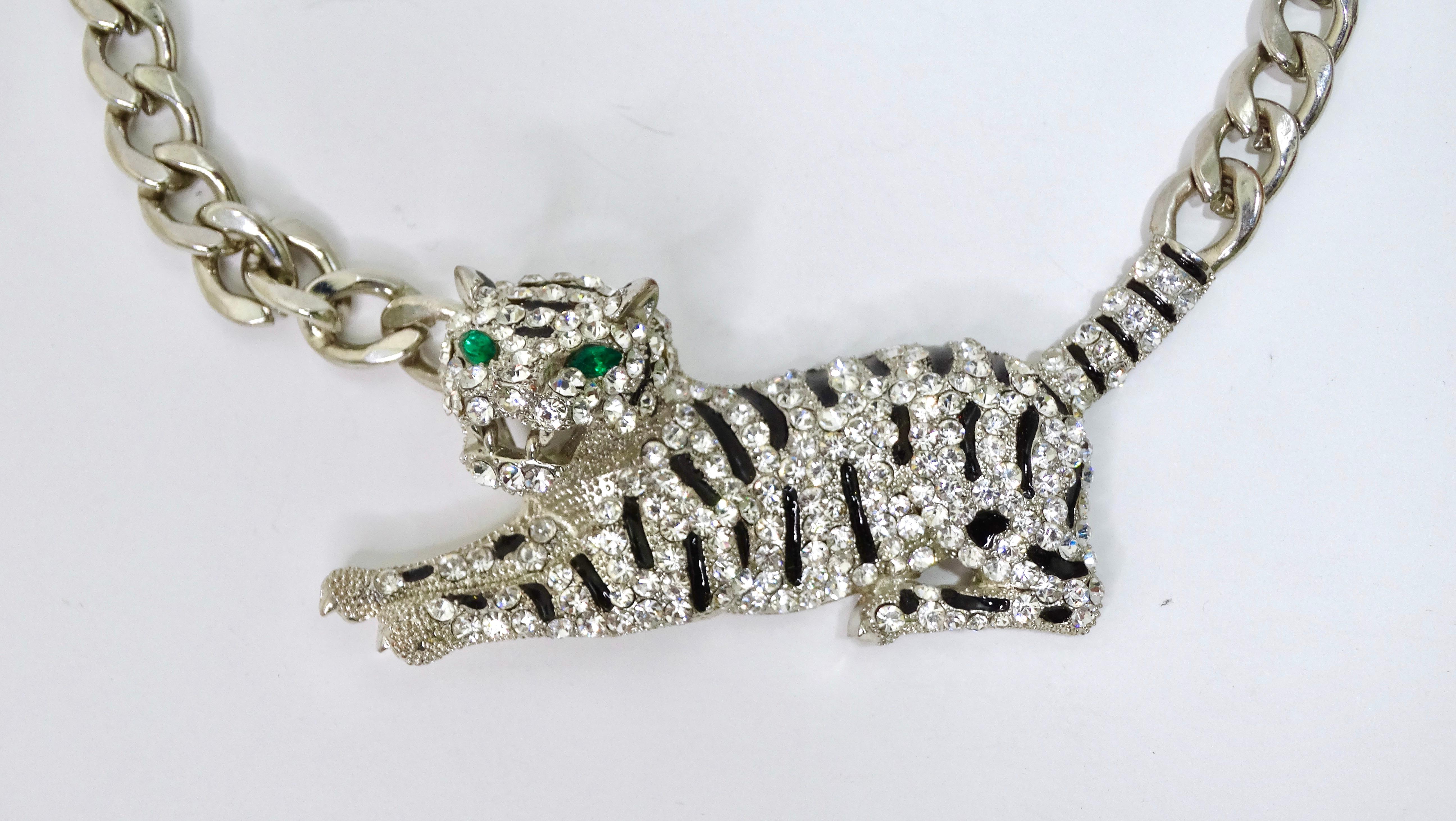 Get your hands on an amazing vintage necklace today! This necklace has a large tiger pendant that measures 3.75 inches by 1.5 inches and is completely embellished in clear and black crystals with fierce green crystals for the eyes. As we all know,