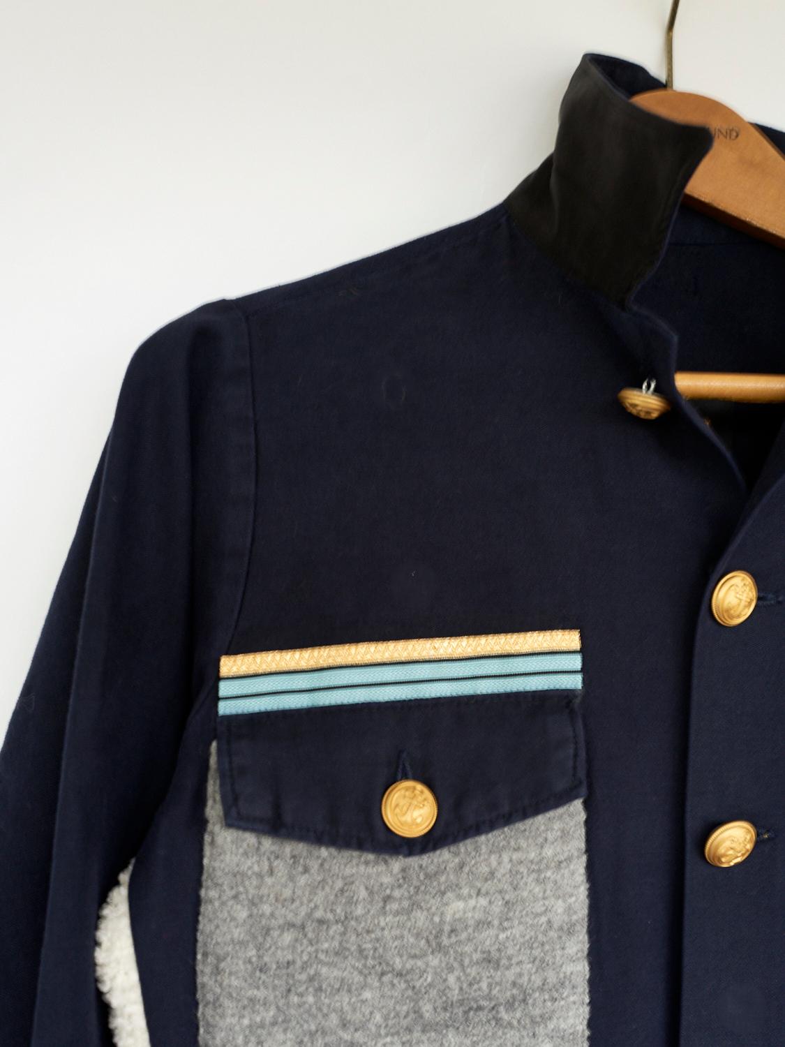 Embellished Grey Wool, French White Fuzzy Blend on a Dark Blue Jacket Military Gold Braid 
Brand: J Dauphin
Size: S/M
Sustainable Luxury, Collectible Vintage Re- Purposed

Our one of a kind, zero waste, up-cycled jackets are made from vintage,