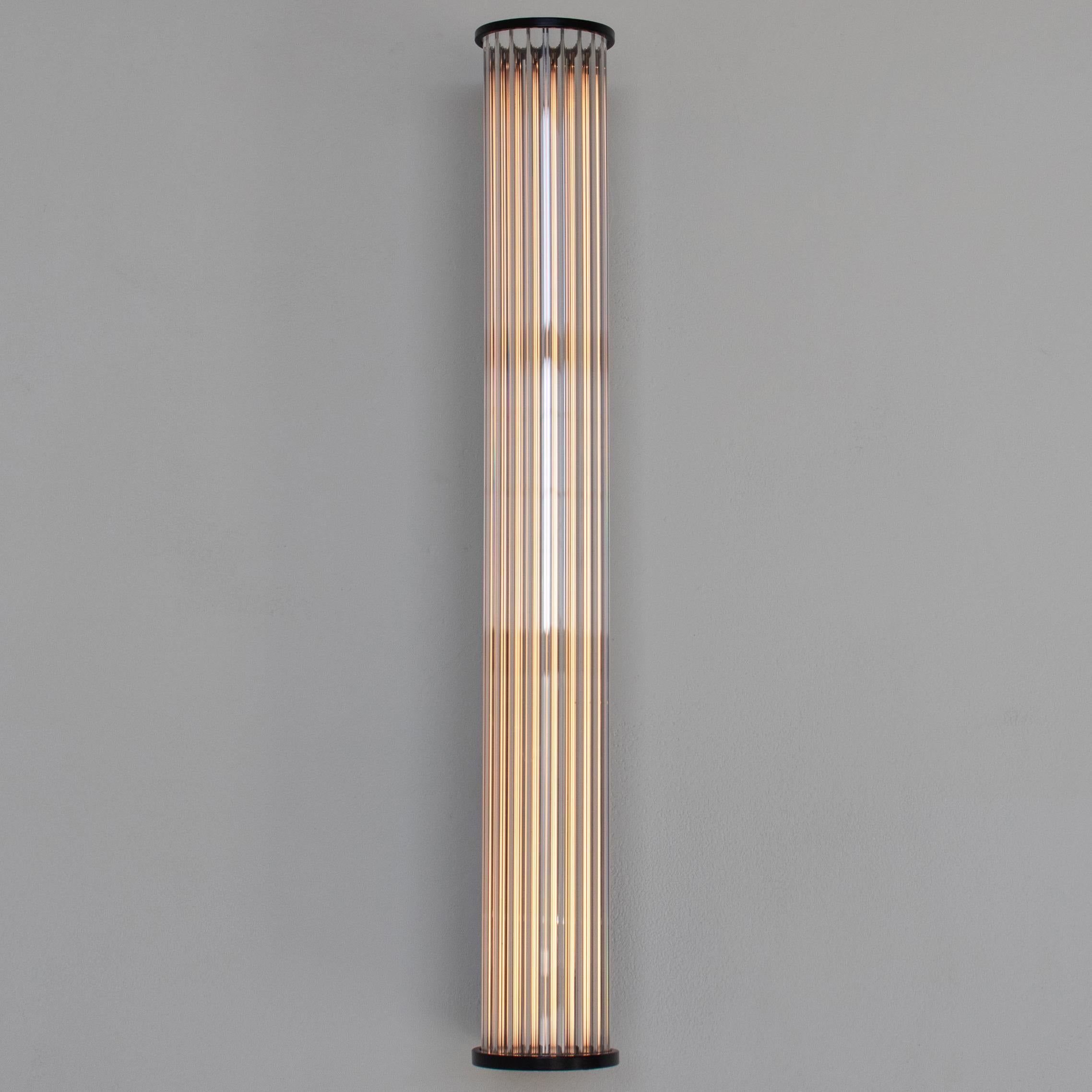 The EMBER S1 Wall Sconce boasts a unique design with a radiant scalloped glass tube diffuser and 2 delicate rings that securely hold the diffuser in place, creating a warm and inviting glow.

Available in a variety of finishes and sizes.
Inquire