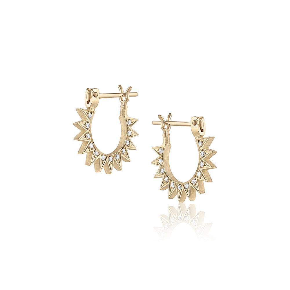The Pavé Baby Spur Hoops – designed and handmade by EMBLM Fine Jewelry

Sold as a pair, the Pavé Baby Spur Hoops can be worn on either ear with the diamonds facing in or out. 

Product Details:
8mm inner diameter
14k yellow gold
pavé white