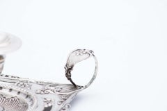 Embossed and cut silver paddle