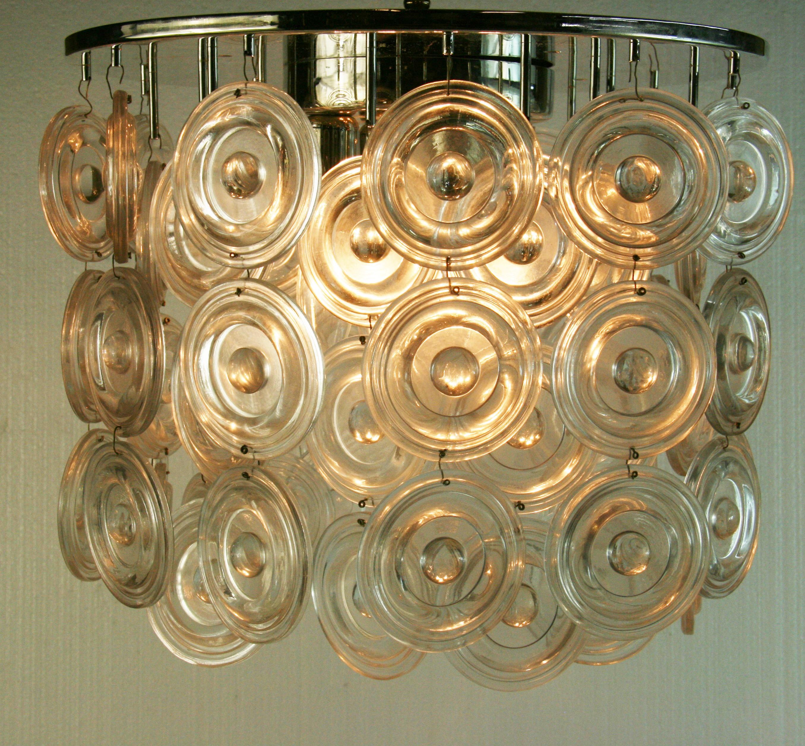 1676 Embossed glass disc flushmount
4 internal candelabra based sockets