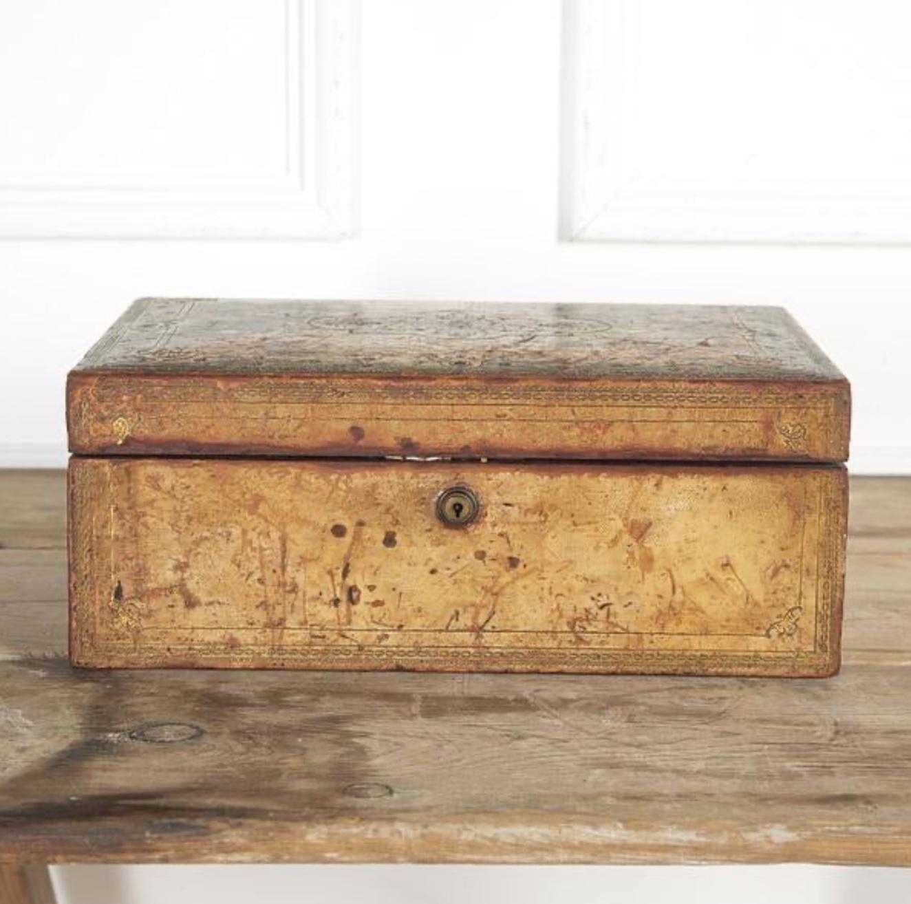 Embossed leather box from Victorian England. Simple yet elegant, this 1900s English storage vessel adds a touch of discreet charm to any desk or tabletop. 

England, circa 1900

Dimensions: 6H x 15W x 12D.