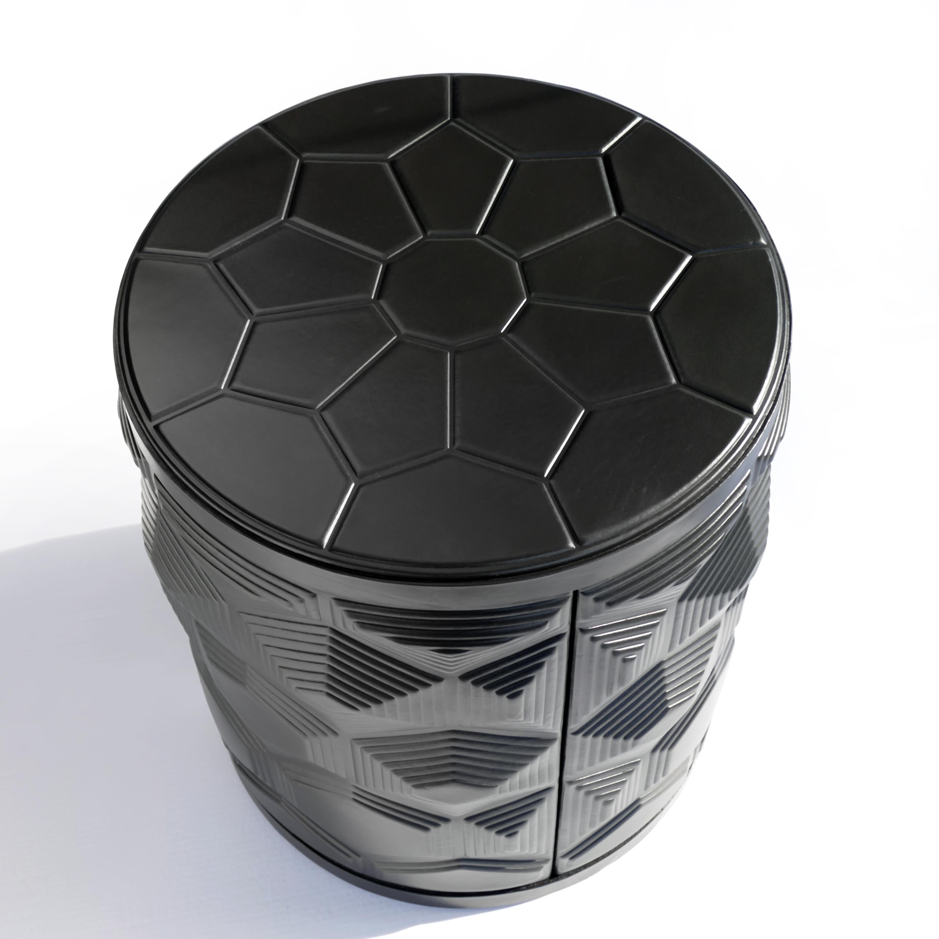 The Turtle Table is inspired by both nature and human design. The motif is drawn from the beautiful, intricate patterning of a turtle’s shell while the drum shape lends a familiar yet contemporary feel. The carefully crafted patterns create a