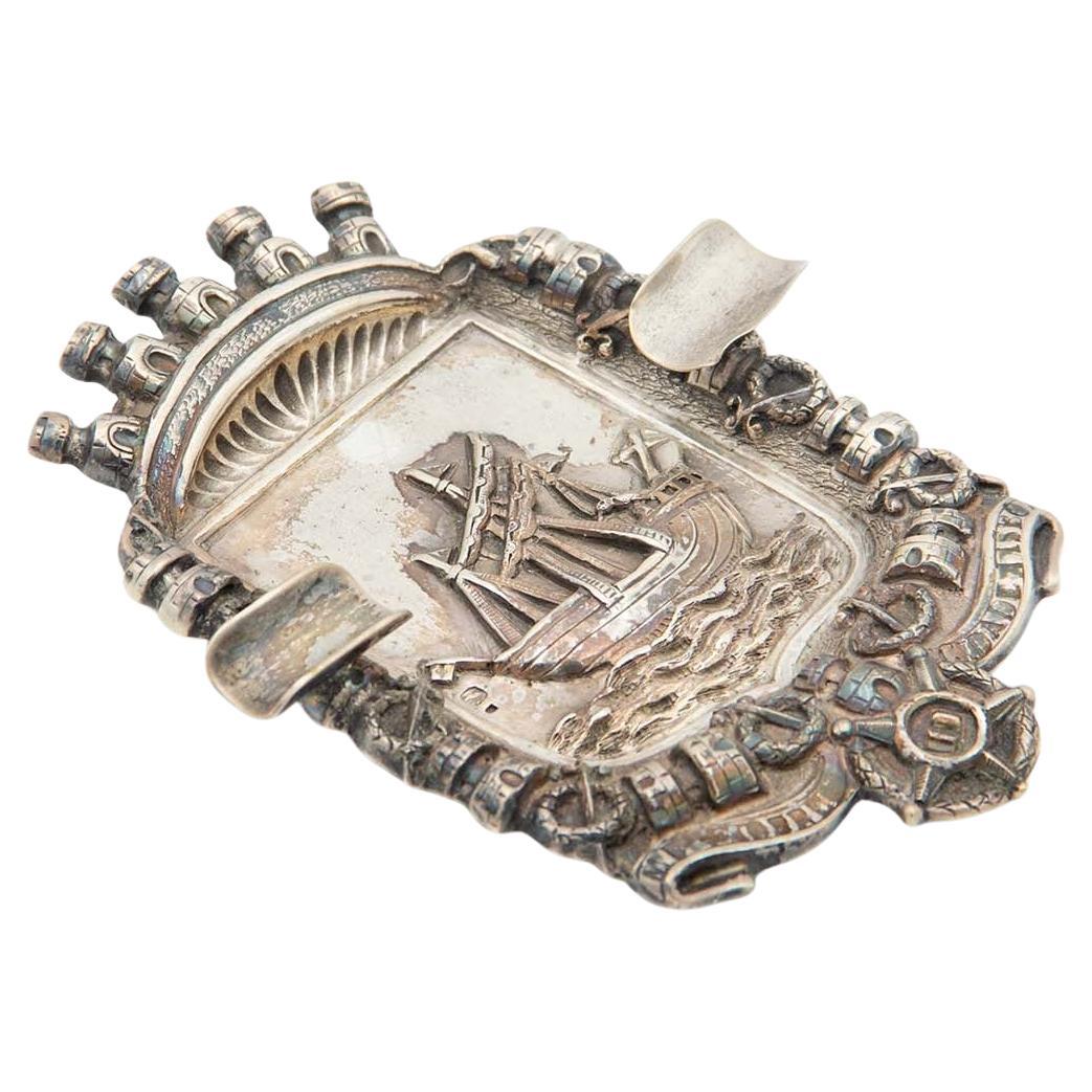 Embossed silver ashtray with a sailing ship