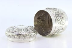 Embossed silver box with cylindrical Hindu deities