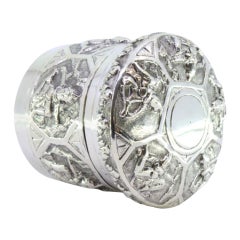 Embossed silver box with cylindrical Hindu deities