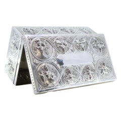 Embossed silver box with Hindu deities, frieze and monogram