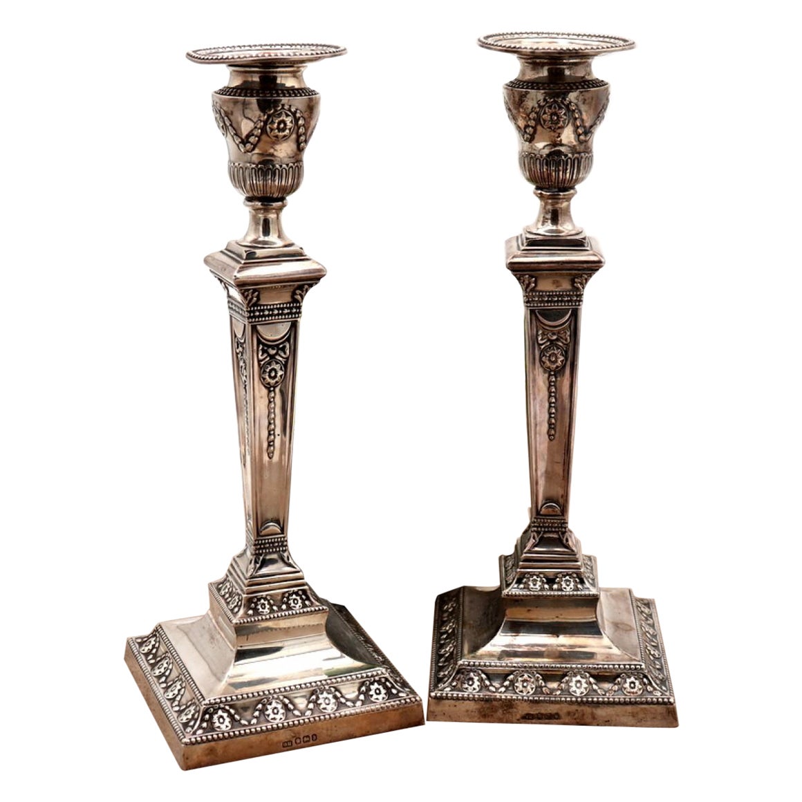 Embossed silver candlesticks