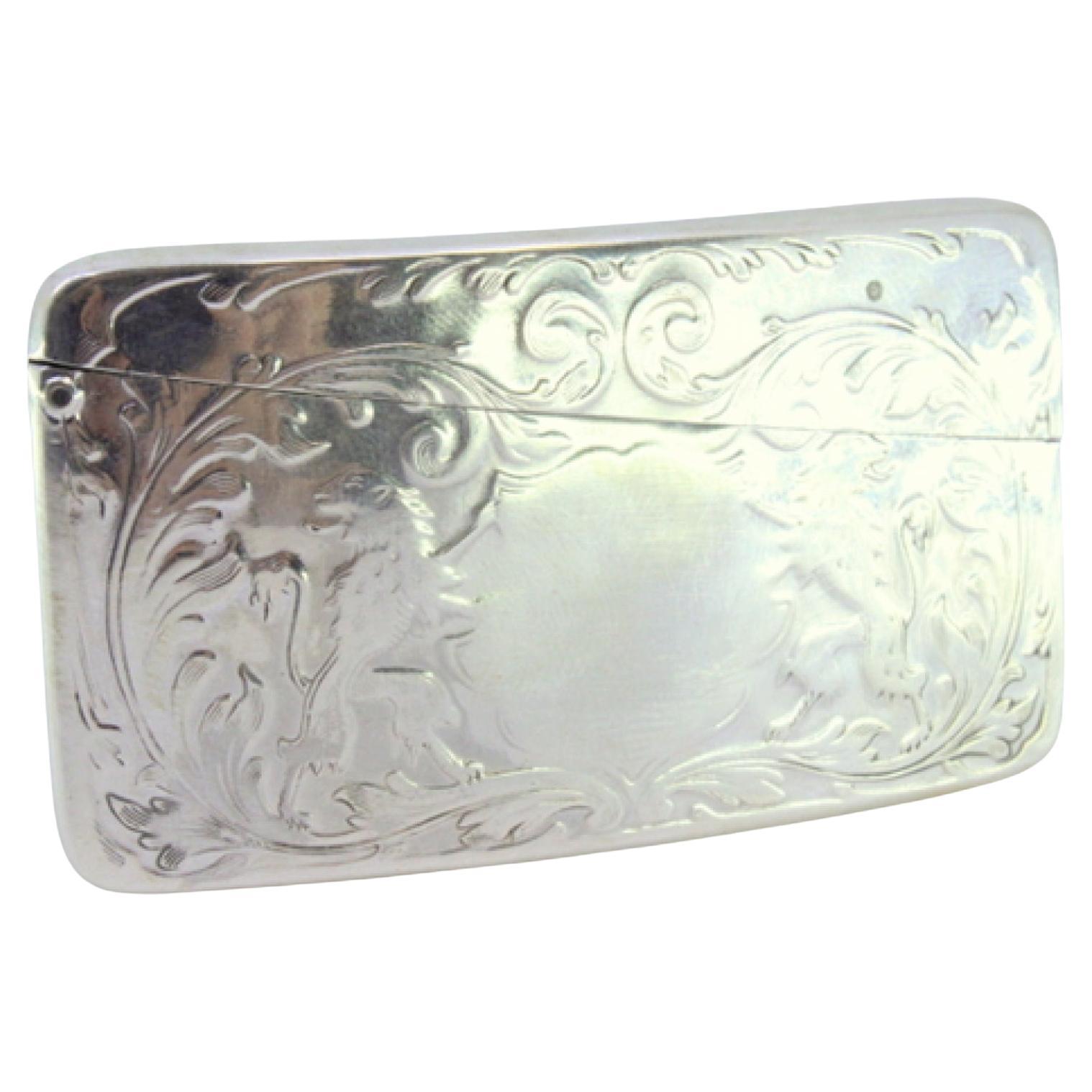 Embossed silver card case with coat of arms between lions For Sale