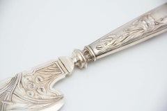 Embossed silver fish knife
