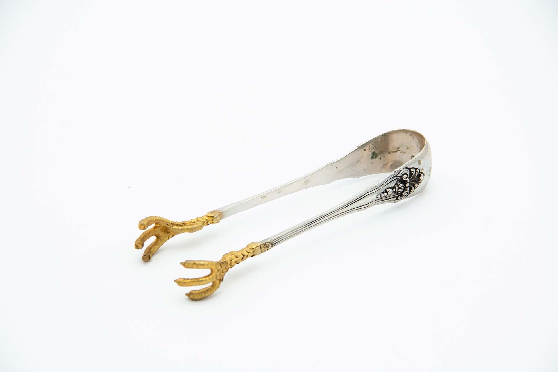 Embossed silver ice tongs