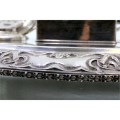 Embossed silver inkwell with two tanks, ceramic cores & embossed feet