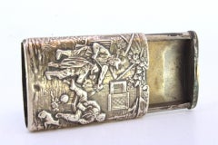 Embossed silver matchbox with players in everyday scenes and sliding lid