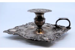 Embossed silver paddle prepared for lamp