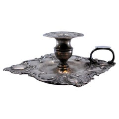 Embossed silver paddle prepared for lamp