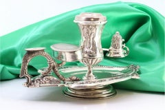 Embossed silver paddle with flame arrester and embossed matchstick