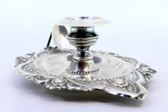 Embossed silver paddle with pearly frieze around the edge