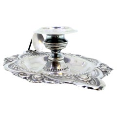 Embossed silver paddle with pearly frieze around the edge