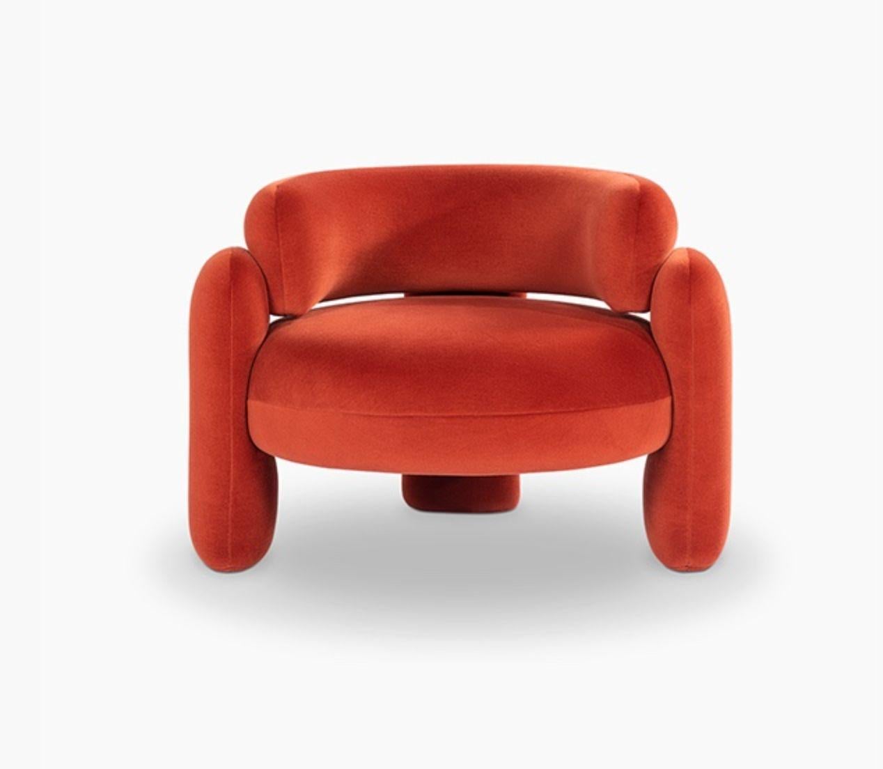Embrace armchair by Royal Stranger
Dimensions: 96 x 85 x 68 cm
Different upholstery colors and finishes are available.
Materials: Velvet

Featuring an enfolding composition of geometrical shapes, the embrace armchair will cozy you up in a