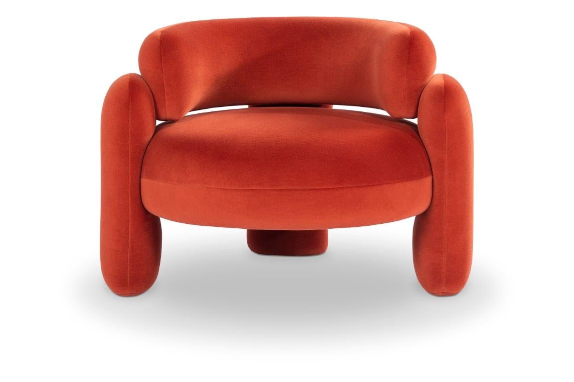 Embrace Sessel von Royal Stranger
Abmessungen: B 96 x T 85 x H 68 cm.
MATERIALIEN: Samt.
Es sind verschiedene Farben und Ausführungen der Polsterung erhältlich. 

Der Embrace-Sessel ist eine Komposition aus geometrischen Formen und macht es Ihnen in