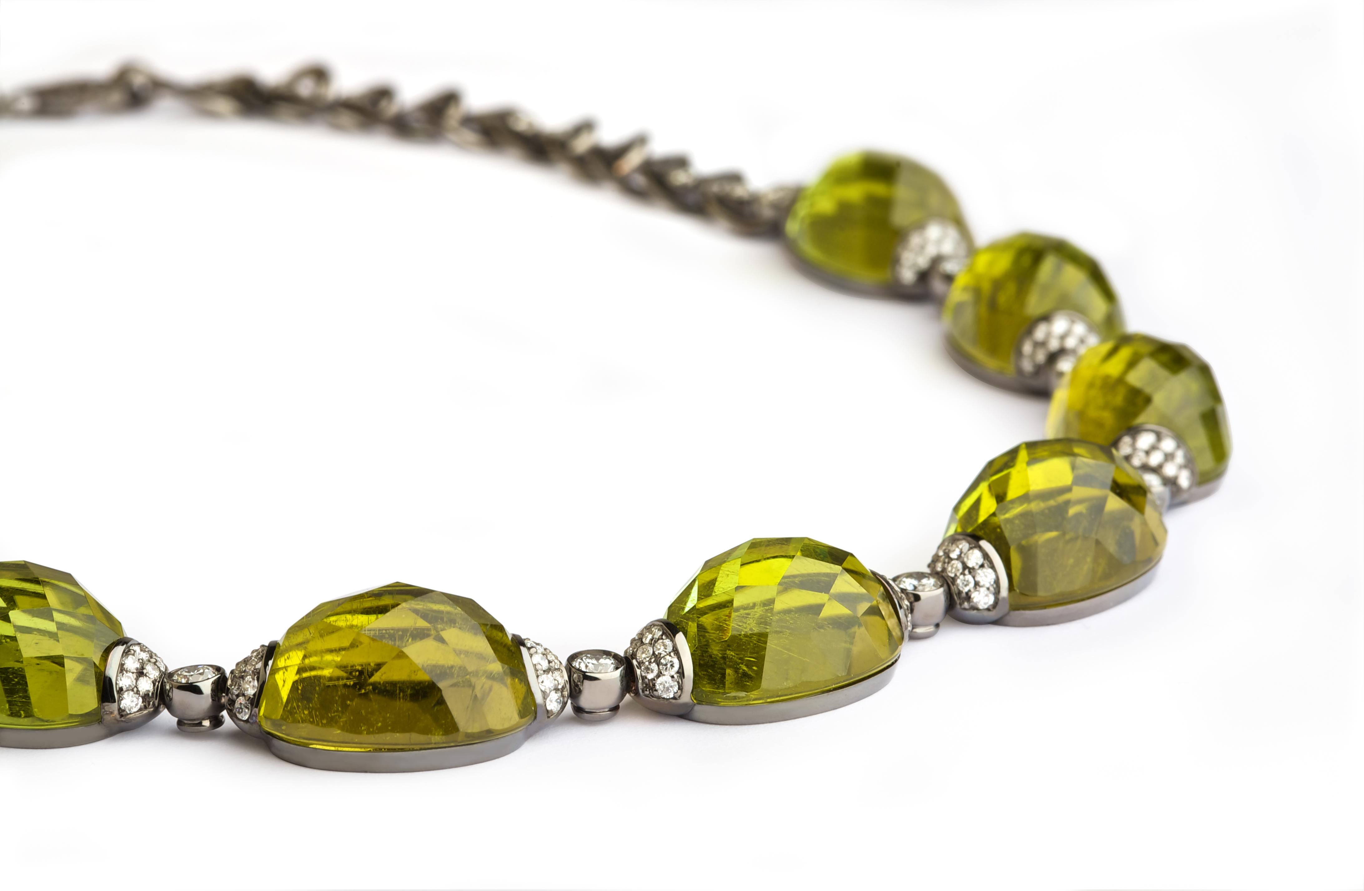 Embrace Collection by Angeletti. Faceted Light Green Tourmaline From Unique Stone, Diamonds and Gold.
Exceptional Tourmaline of around ct. 200 Cut into 9 Stones and faceted by Expert Hands. Wholly Natural, No treatment at all. The Light Green