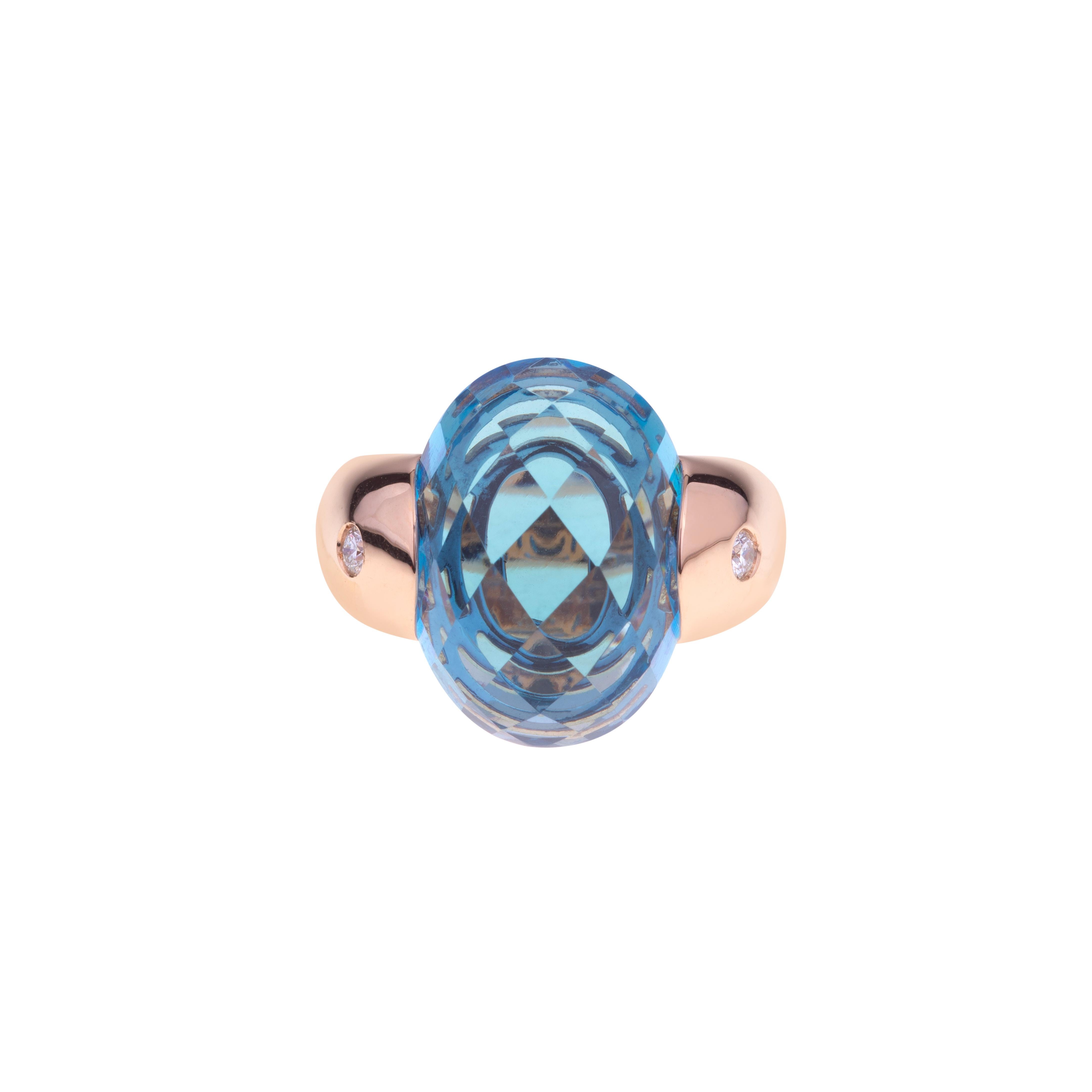 Modern Embrace Collection by Angeletti. Rose Gold Ring With Blue Topaz and Diamonds For Sale