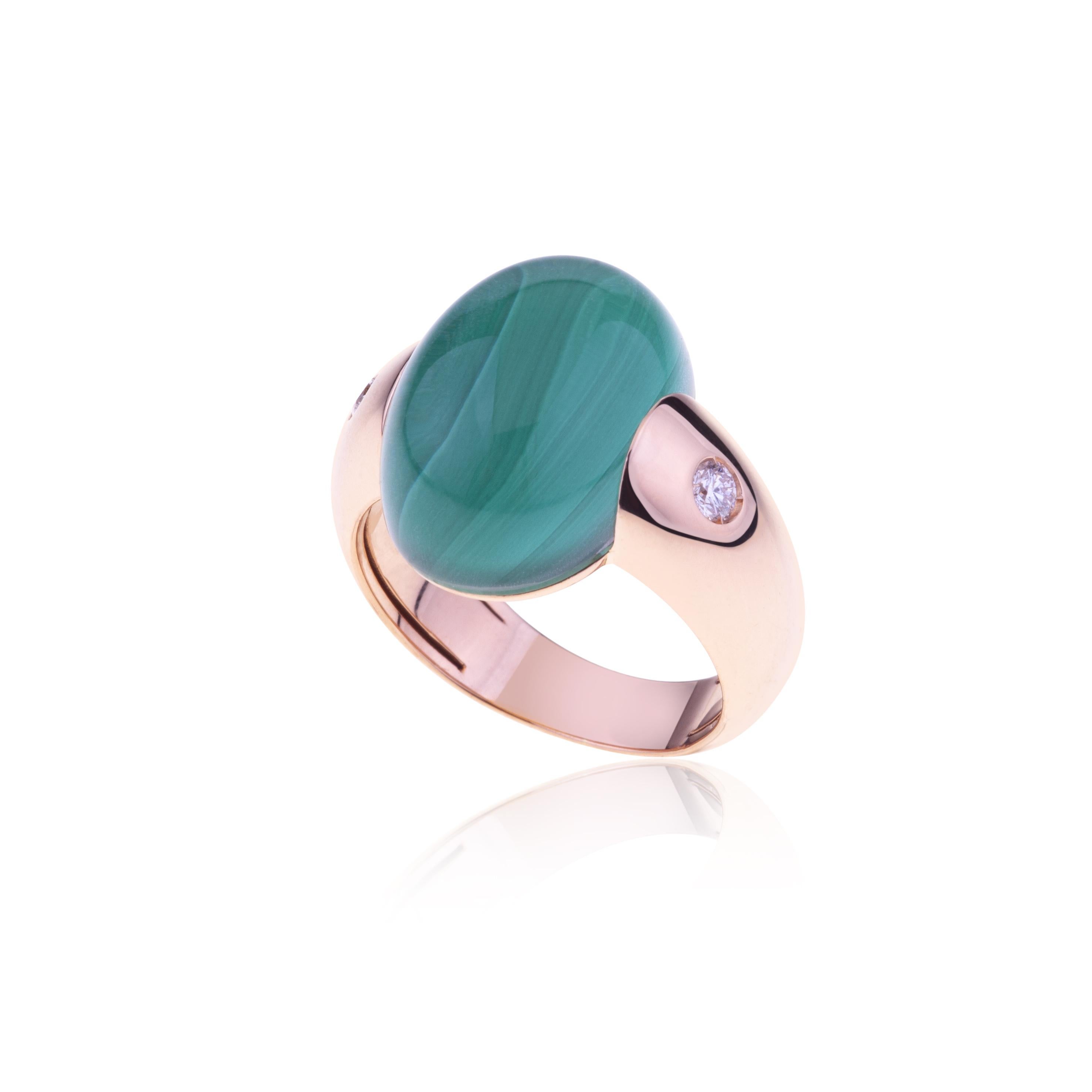 Embrace Collection by Angeletti. Rose  Gold Ring With Malachite and Diamonds.
Iconic Embrace Model, Designed and Manifactured in Rome.
Malachite topped with christal rock is the brilliant green in the center. On the side of the ring, two diamonds 
