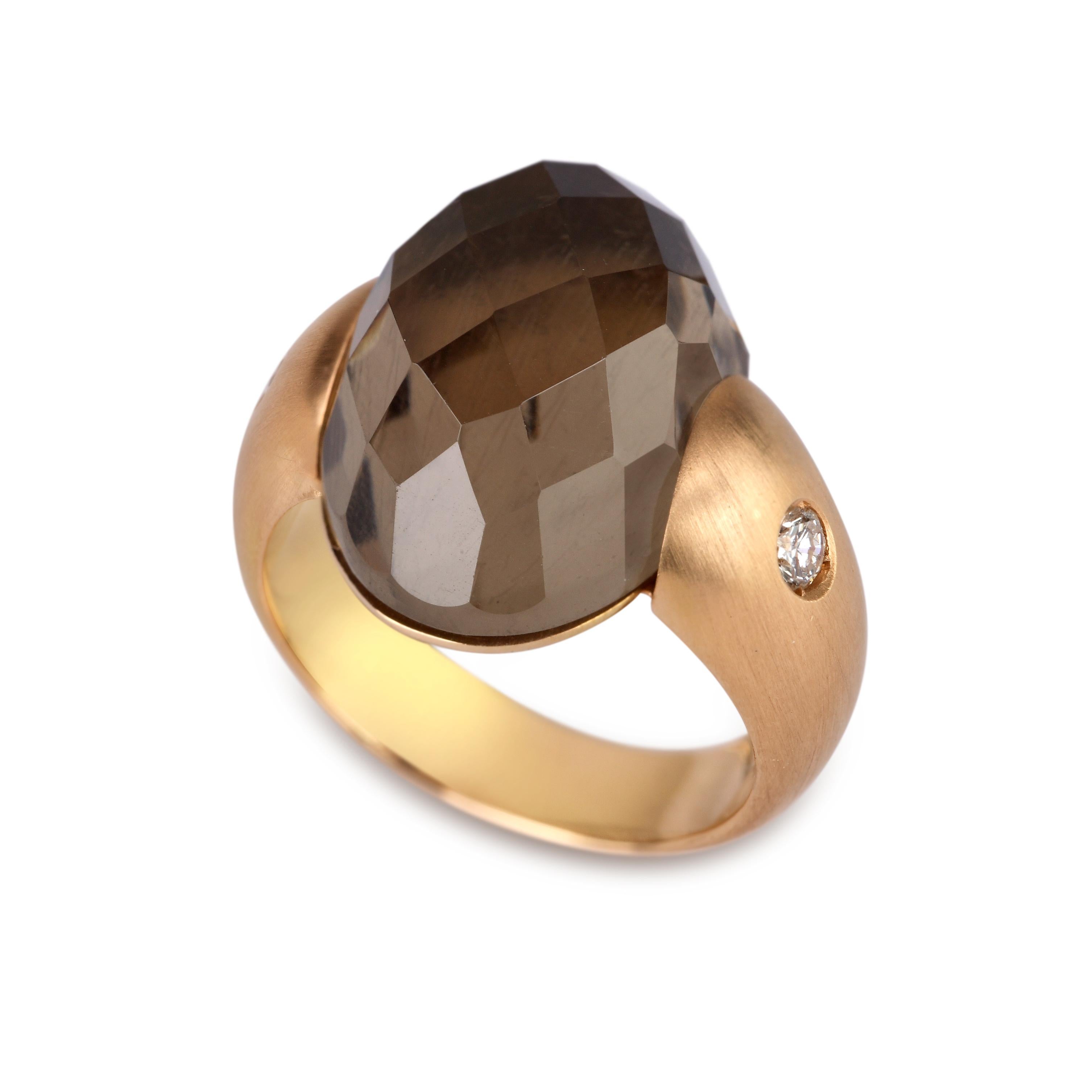Embrace Collection by Angeletti. Rose  Gold Ring With Smoky Quartz and Diamonds.
Iconic Embrace Model, Designed and Manifactured in Rome.
On the side of the Smoky Quartz, two diamonds  ct. 0.16. Gold Weight is Around 9 gr.
Very Confortable for a