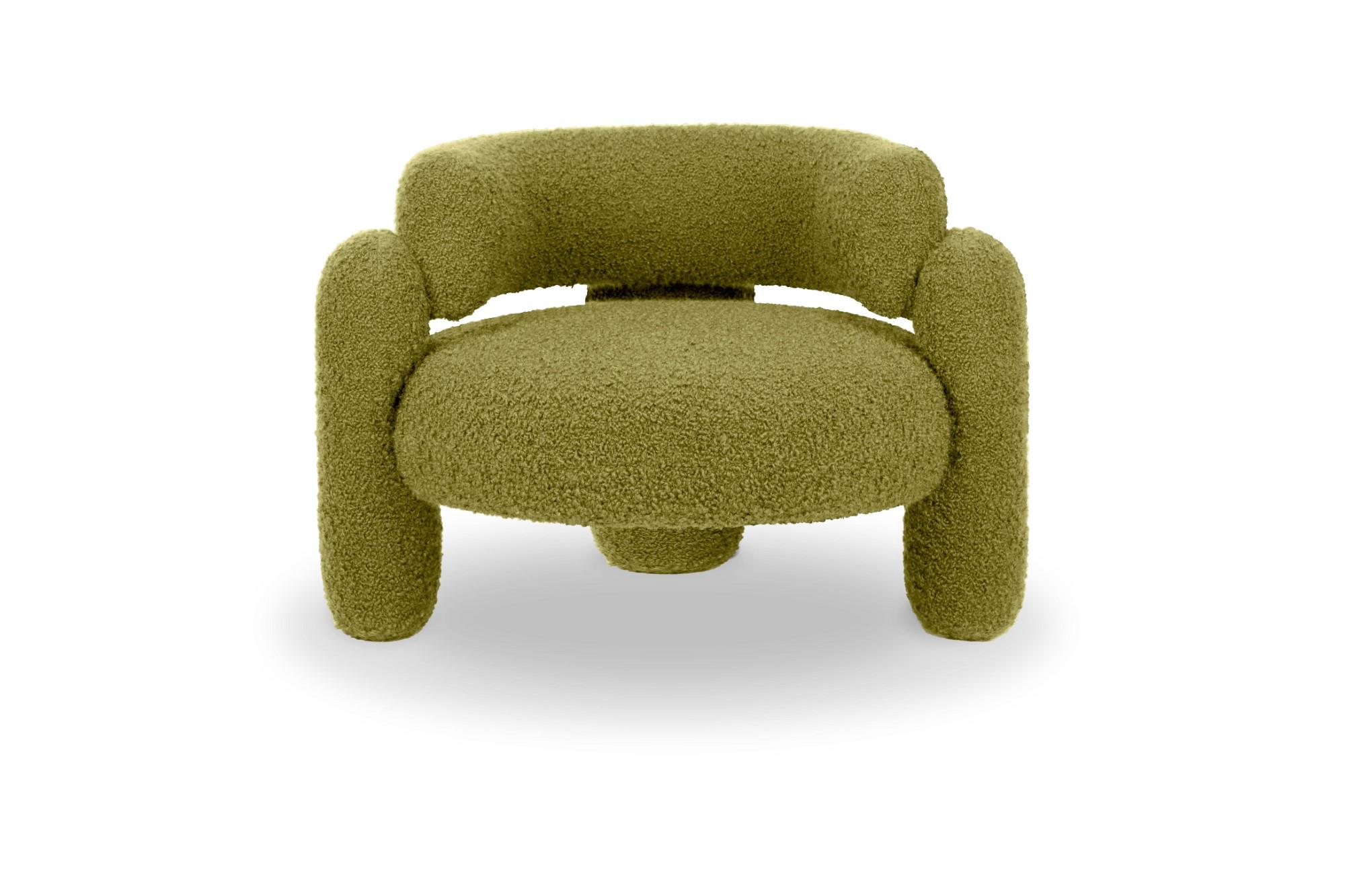Embrace cormo acacia Armchair by Royal Stranger
Dimensions: W 96 x D 85 x H 68 cm.
Different upholstery colors and finishes are available.
Materials: Upholstery.

Featuring an enfolding composition of geometrical shapes, the Embrace Armchair