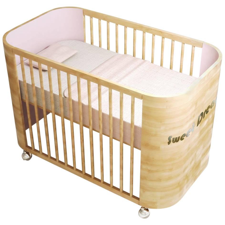 Embrace Dreams Crib in Beechwood and Cotton Candy Pink by MISK Nursery For Sale