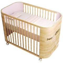 Embrace Dreams Crib in Beechwood and Cotton Candy Pink by MISK Nursery