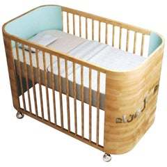 Embrace Dreams Crib in Beechwood and Sky Blue by MISK Nursery