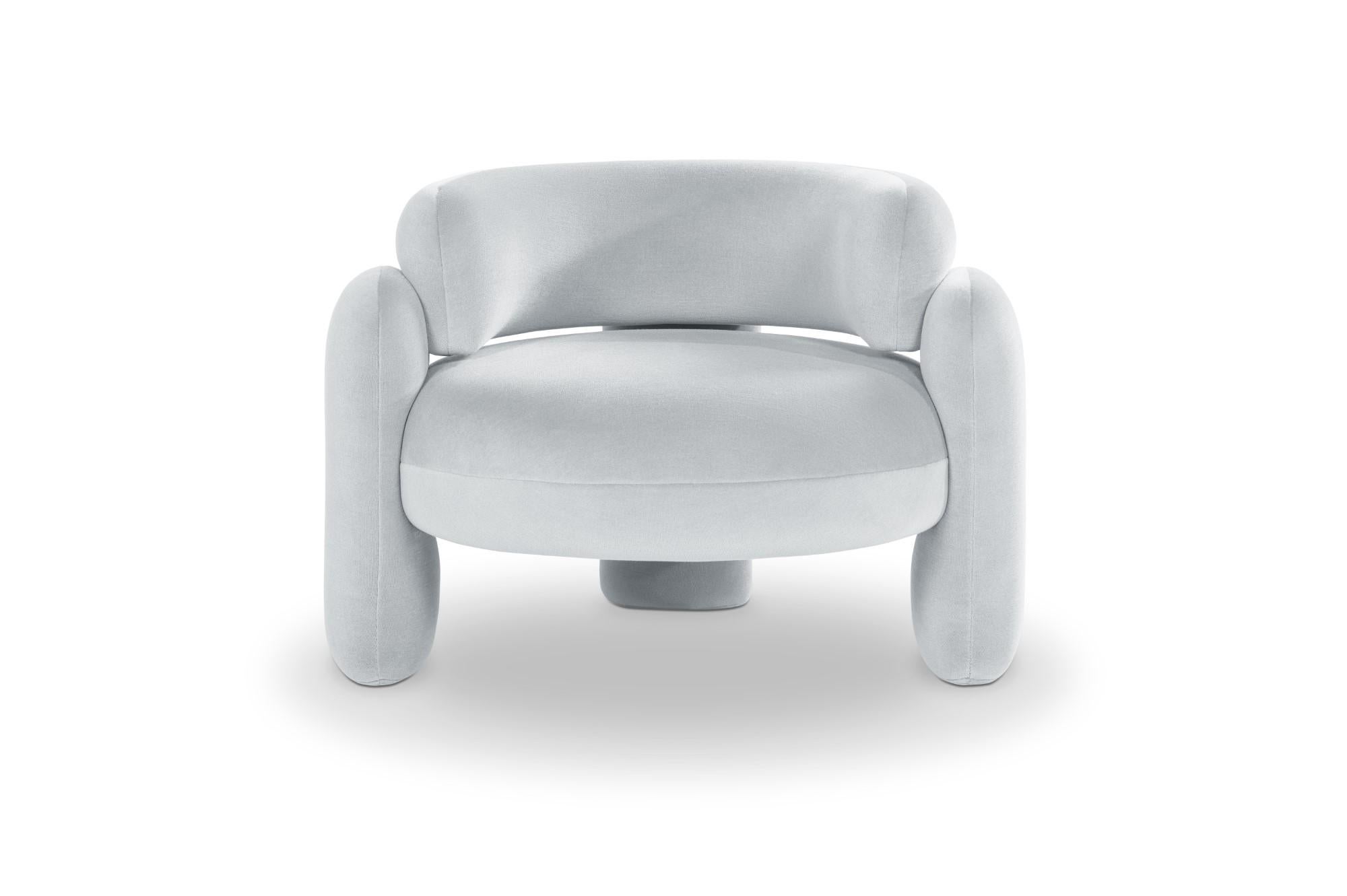 Embrace gentle 113 armchair by Royal Stranger 
Dimensions: W 96 x D 85 x H 68 cm.
Different upholstery colors and finishes are available.
Materials: Upholstery.

Featuring an enfolding composition of geometrical shapes, the Embrace Armchair
