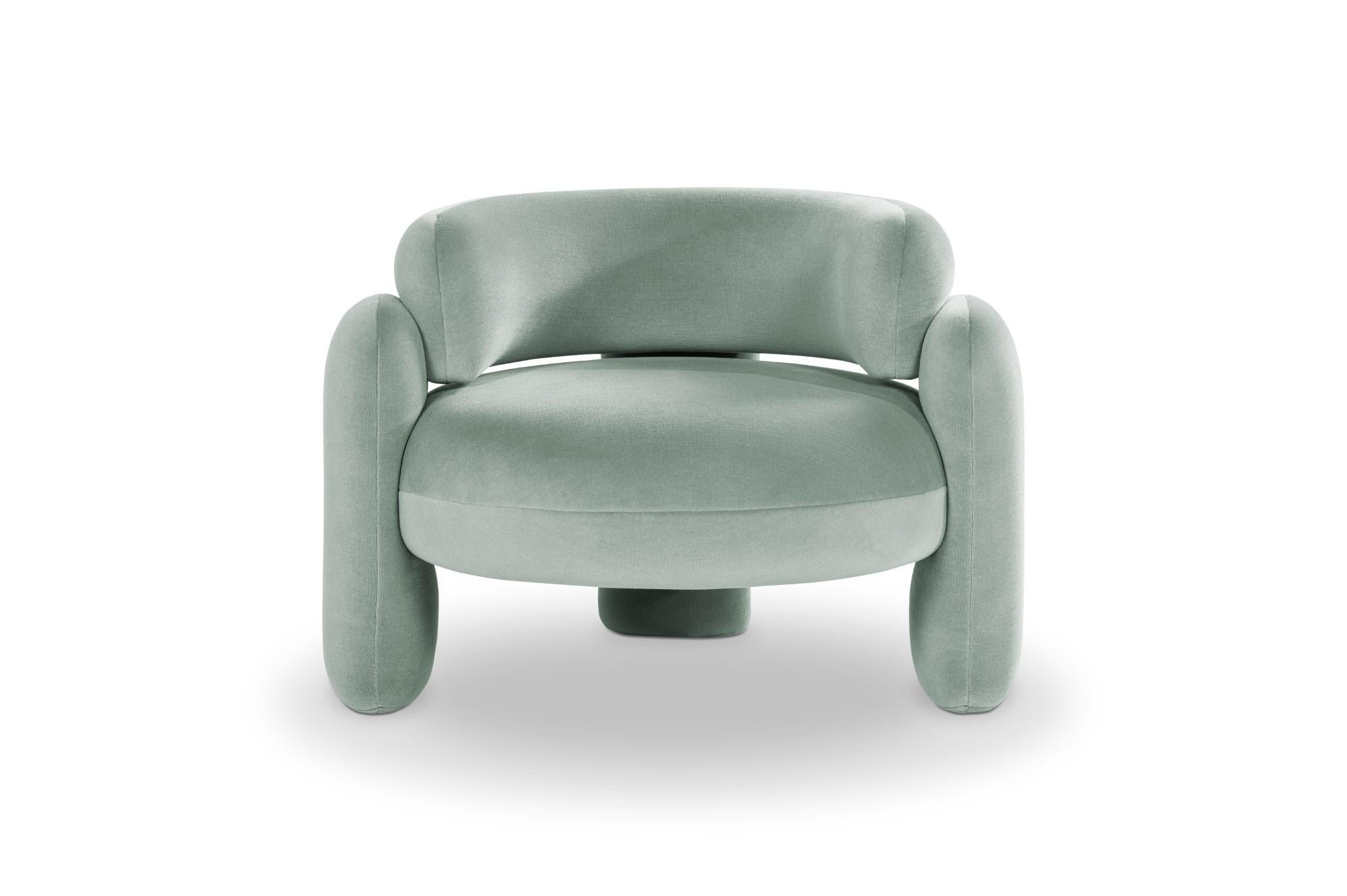 Embrace gentle 933 armchair by Royal Stranger 
Dimensions: W 96 x D 85 x H 68 cm.
Different upholstery colors and finishes are available. 
Materials: Upholstery.

Featuring an enfolding composition of geometrical shapes, the embrace armchair