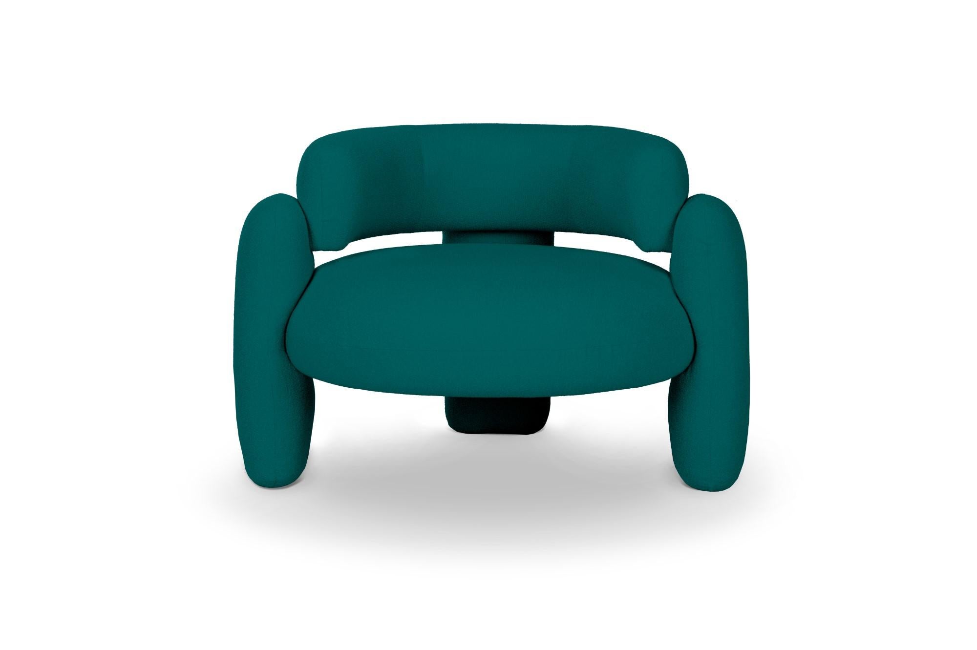 Embrace Lago Canard armchair by Royal Stranger 
Dimensions: W 96 x D 85 x H 68 cm.
Different upholstery colors and finishes are available. 
Materials: Upholstery.

Featuring an enfolding composition of geometrical shapes, the Embrace Armchair