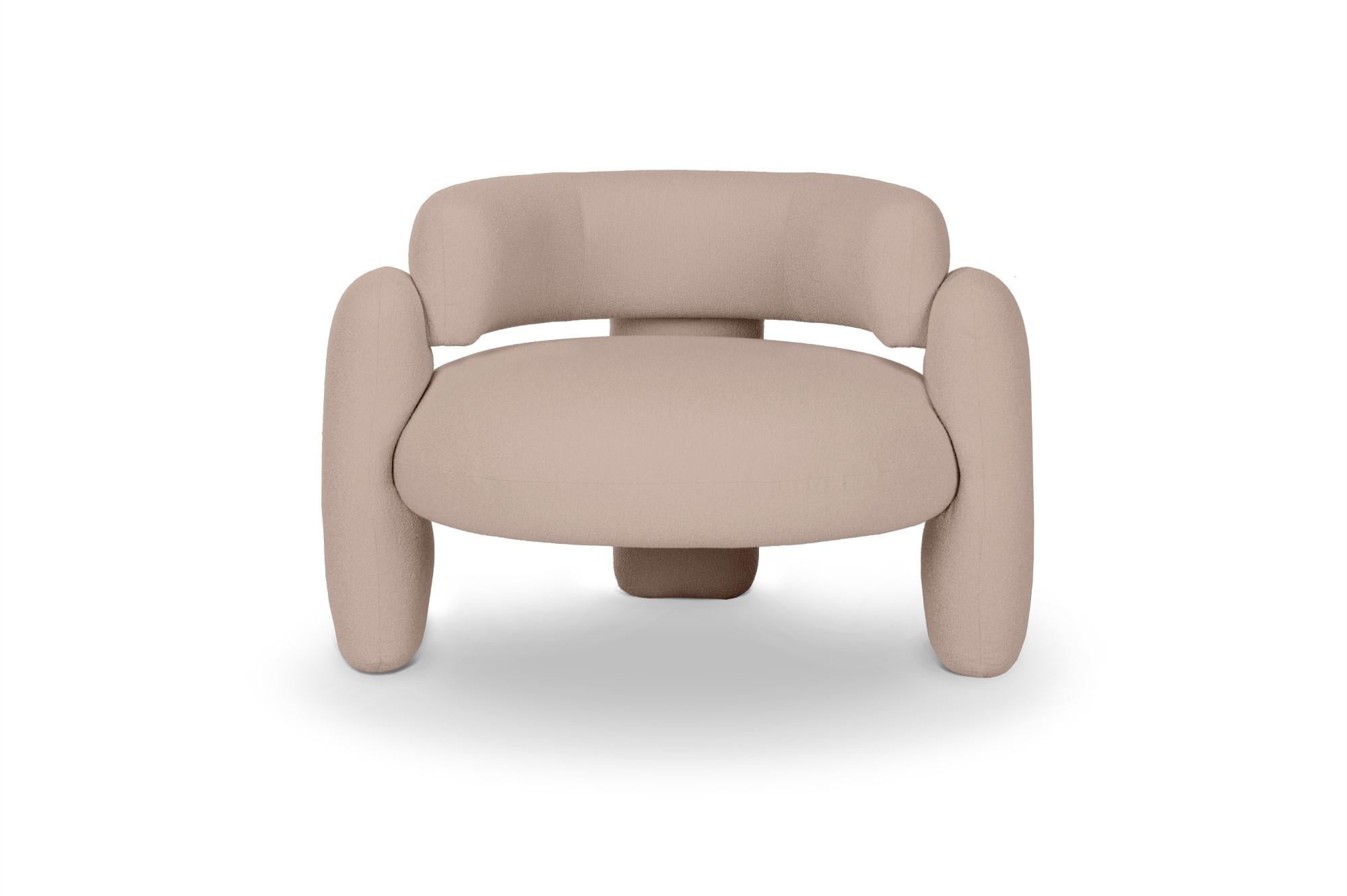 Embrace Lago Lin armchair by Royal Stranger
Dimensions: W 96 x D 85 x H 68 cm.
Different upholstery colors and finishes are available.
Materials: Upholstery.

Featuring an enfolding composition of geometrical shapes, the Embrace Armchair will