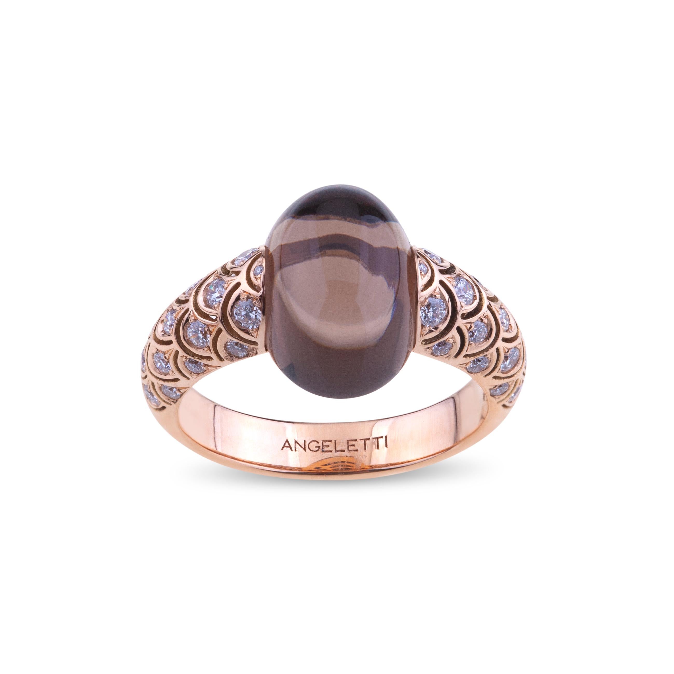 Angeletti Embrace Rose Gold With Diamonds and Cabochon Smoky Quarz Cocktail Ring.
New Wave Version, Designed and Manifactured in Rome. Available in Different Size.
Gold Weight is Around 5 Grams and the Size is 13 but Very Confortable for a range of