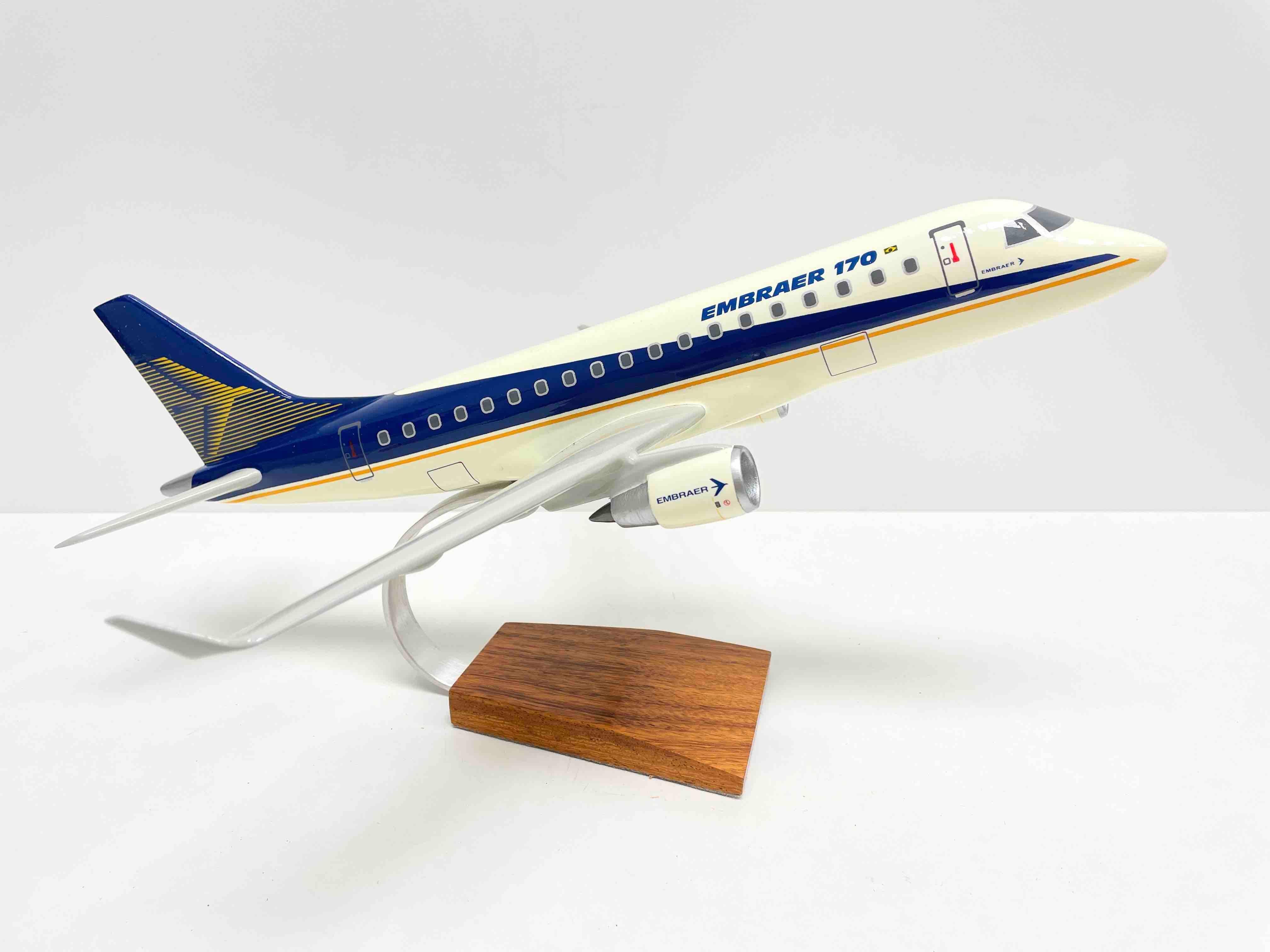 Scaled model of the Embraer 170 Jet. Made of Wood in the Scale of 1/75. This exquisite Embraer 170 Model is handcrafted by a master craftsmen from the finest Wood. Attention is given to every detail, resulting in unsurpassed quality. Models come