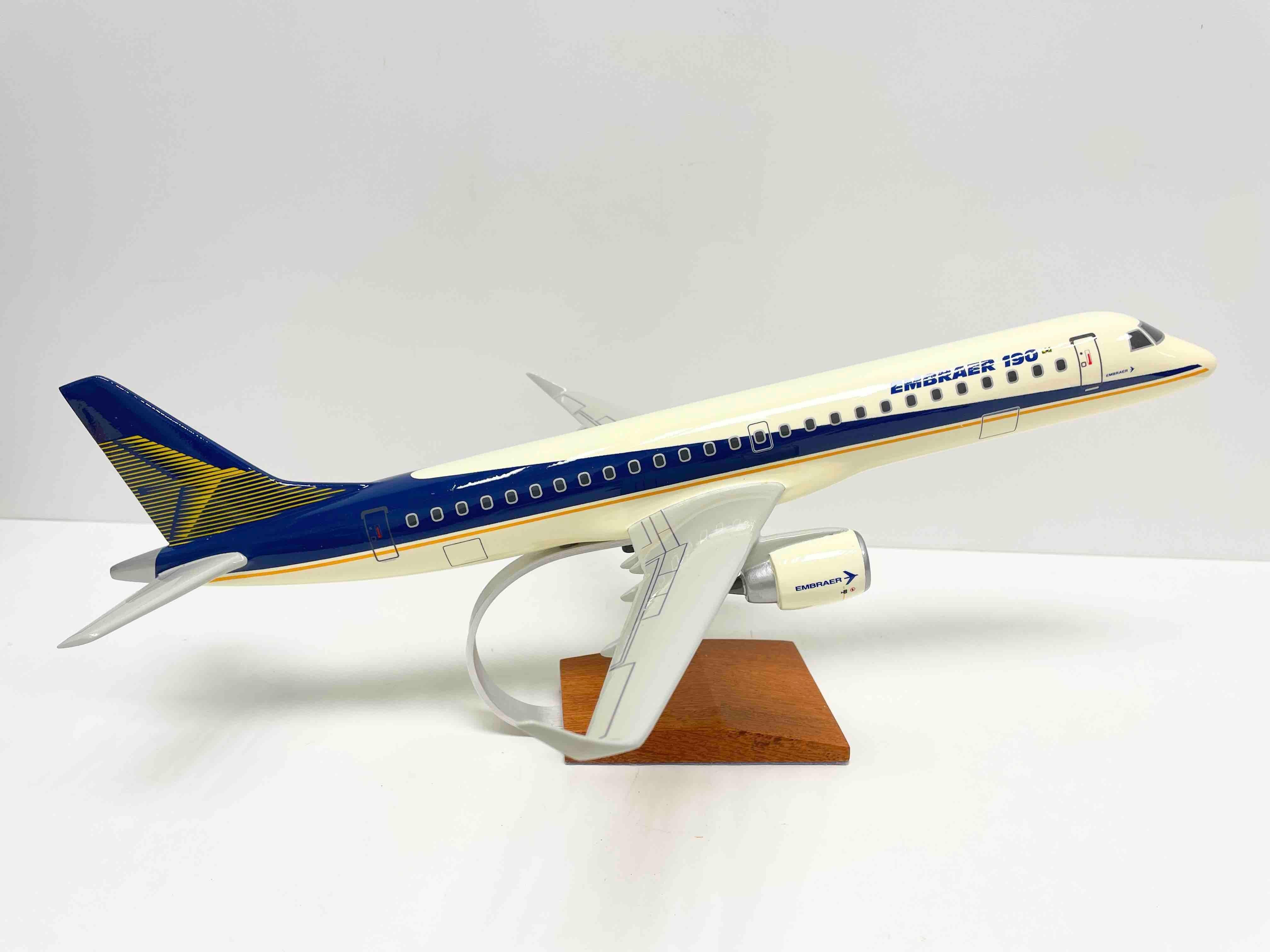 Scaled model of the Embraer 190 Jet. Made of Wood in the Scale of 1/75. This exquisite Embraer 190 Model is handcrafted by a master craftsmen from the finest Wood. Attention is given to every detail, resulting in unsurpassed quality. Models come