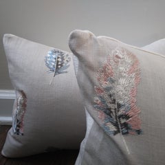 Embroidered Bird Feather Throw Pillows in Pastel Pink and Blue