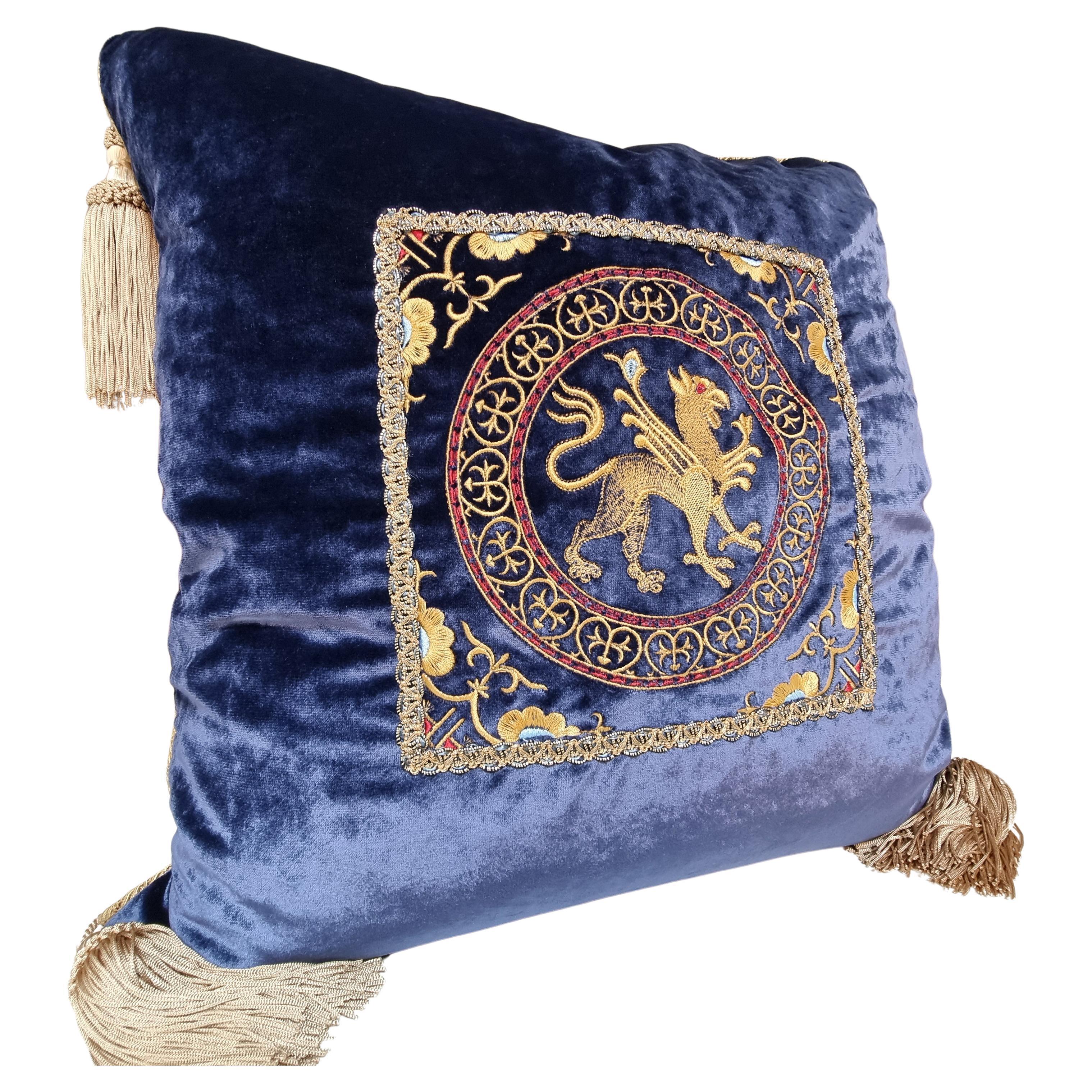 This amazing decorative pillow with beige tassel at the four corners is handmade using Rubelli  velvet in blue color on both sides finished with Houlès  twisted lip cord, embellished with precious embroideries (13th-century design) framed with flat